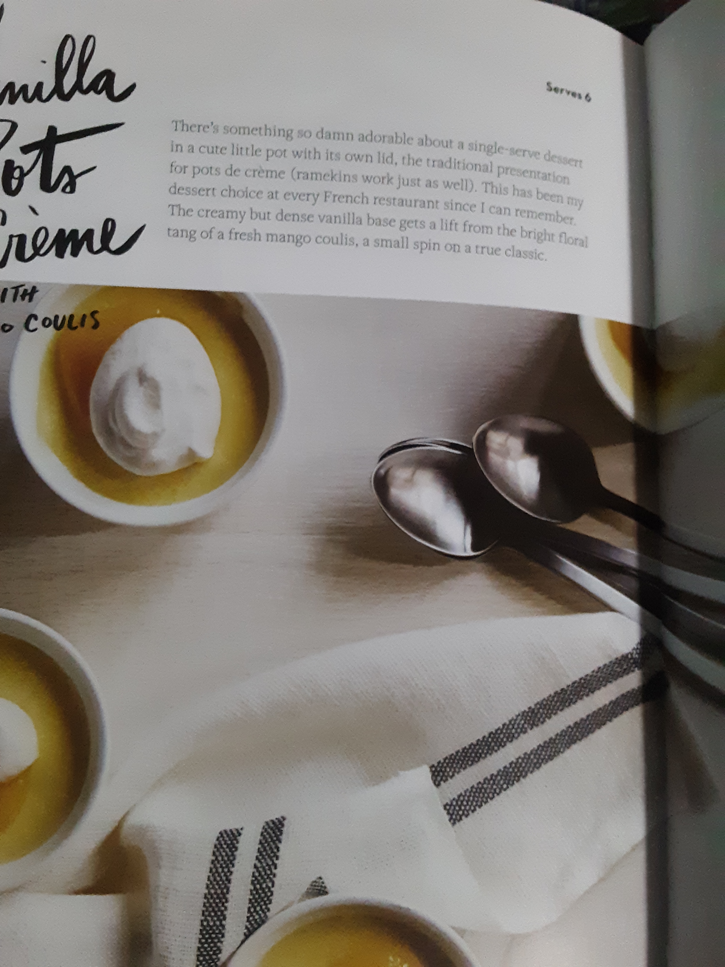 Living well in the 21st century - Limassol, Cyprus - Picture of the first page of the vanilla pots creme with mango coulis recipe. It says, "there's something so damn adorable about a single-serve dessert in a cute little pot with its own lid, the traditional presentation for pots de creme (ramekins work just as well). This has been my dessert choice at every french restaurant since I can remember. The creamy but dense vanilla base gets a lift from the bright  floral tang of a fresh mango coulis, a small spin on a true classic. 
Under the writing,there is a picture of the ramekins with a scoop of whipped white cream with several spoons. 