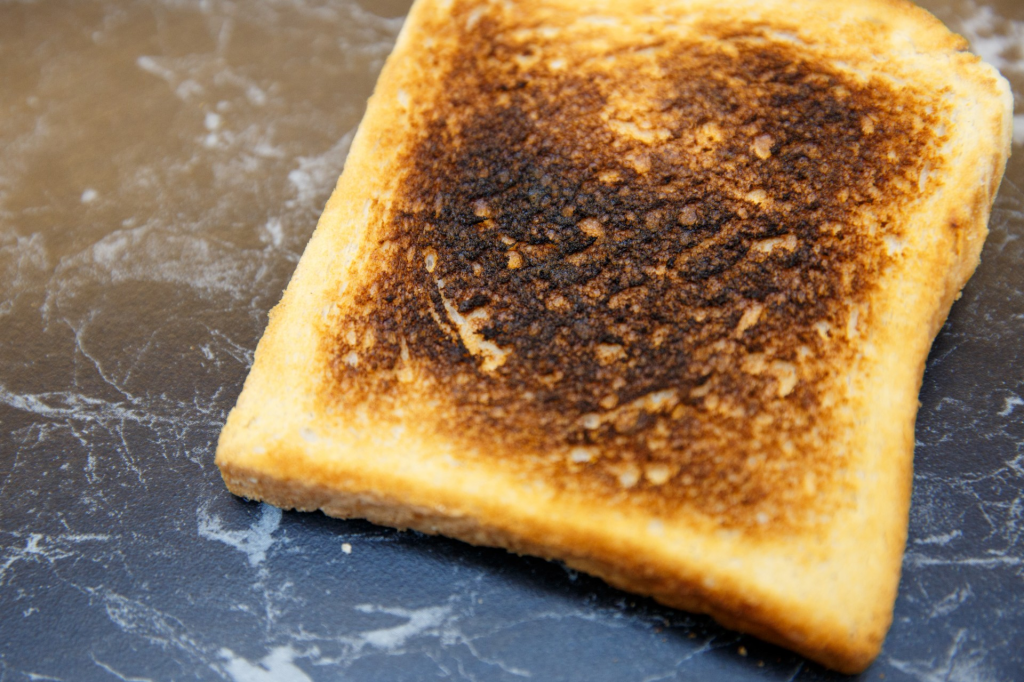 Living well in the 21st century - Limassol, Cyprus. Burnt toast on an marbel kitchen counter. 